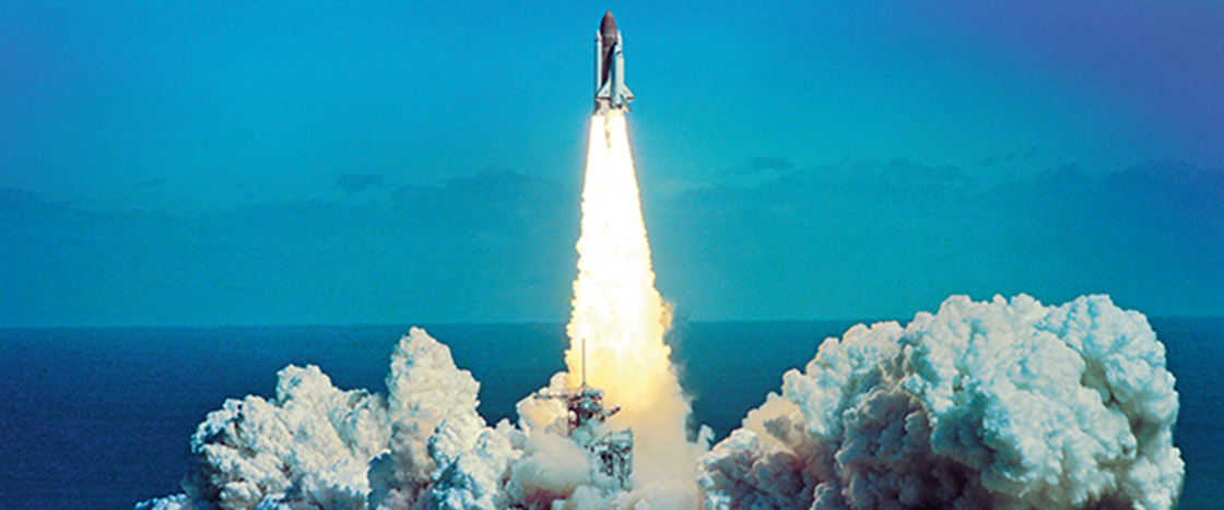 Image of a rocketship launching into space