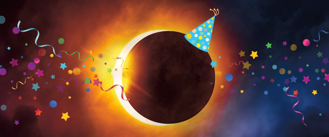 Image of an eclipse with a party hat on